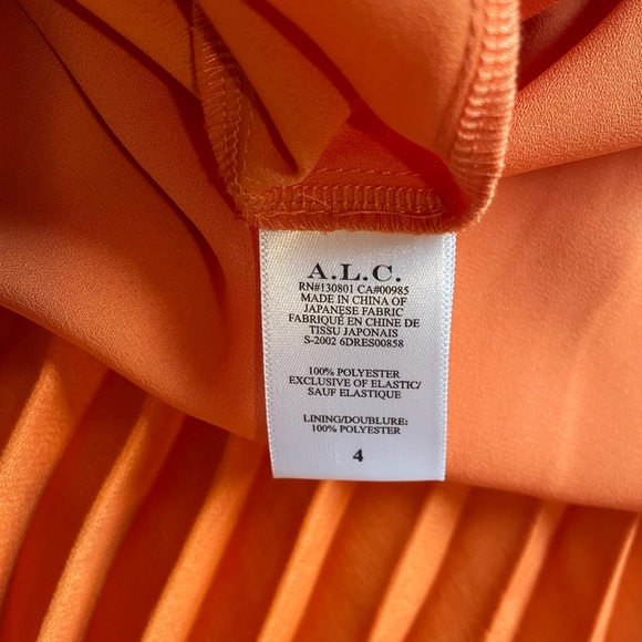 Snazzy Pleated Orange Asymmetrical A.L.C dress. - Picture 7 of 13